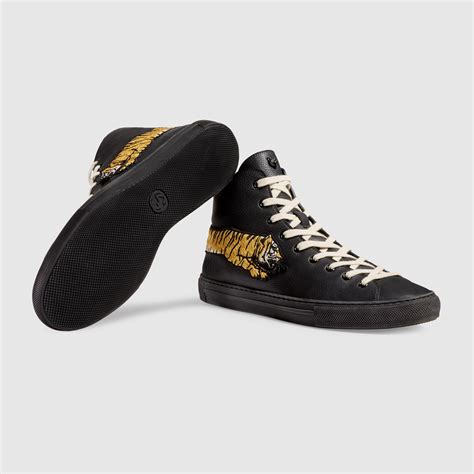 gucci leather high top sneakers|Gucci tiger sneakers high.